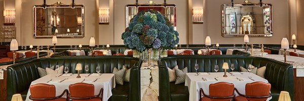 Claridge's Restaurant room with beautiful flowers and table dressed up.