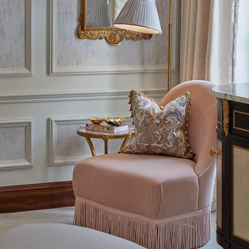 A pink armchair at the Brook Suite at Claridge's