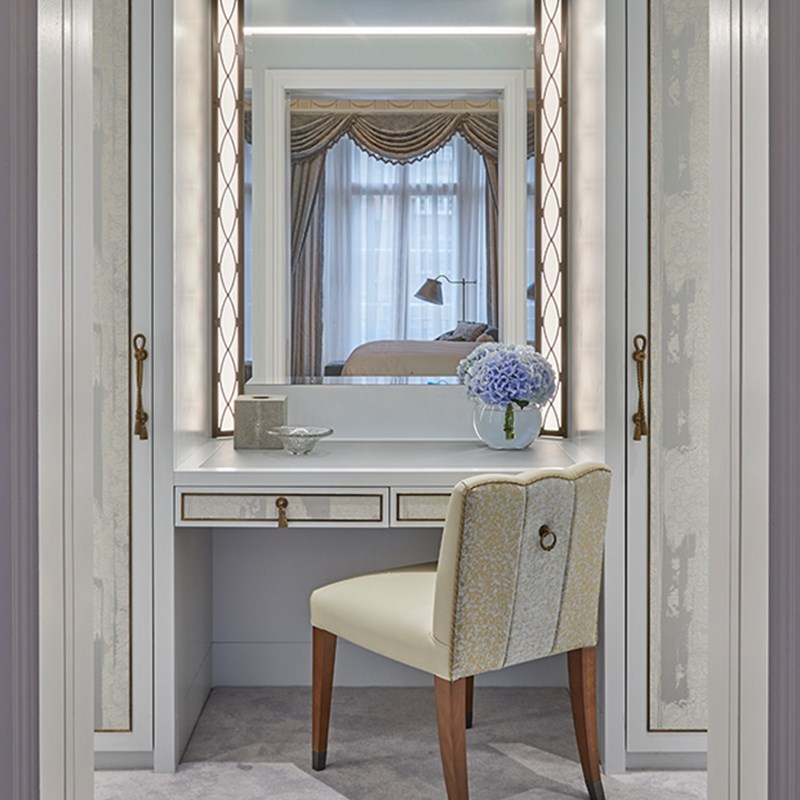 Mayfair Suite Makeup area with mirror and chair.