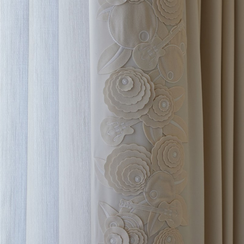 Embroidery on curtains.